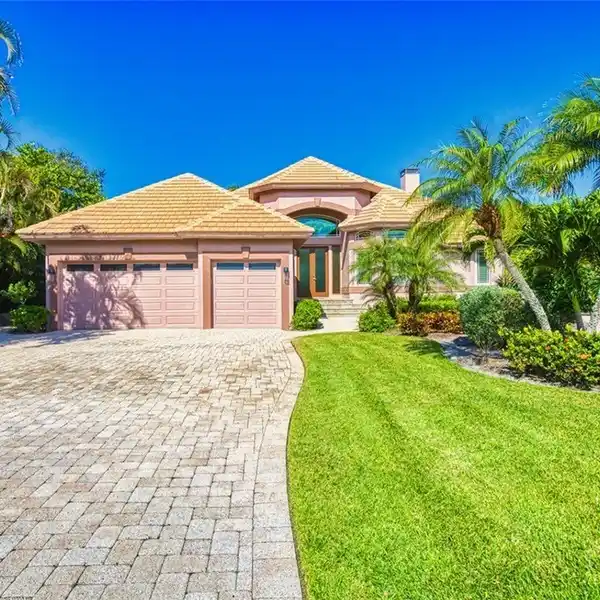 SPECTACULAR ISLAND HOME GREETED WITH SWEEPING WATER VIEWS