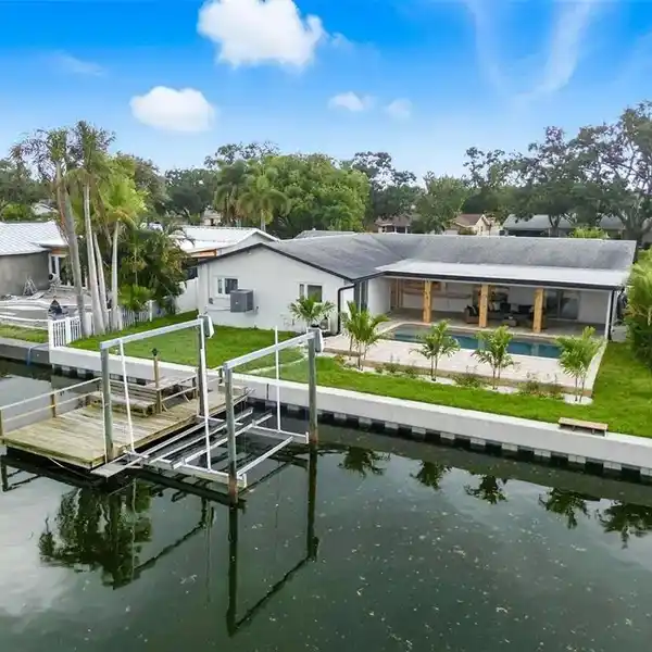 MAGNIFICENT MOVE-IN READY WATERFRONT POOL HOME