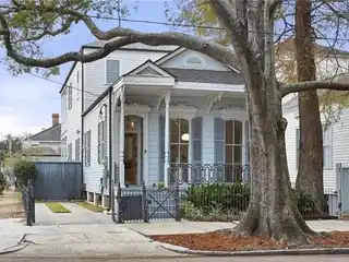 Eastlake Victorian Side Hall Cottage with Carriage House