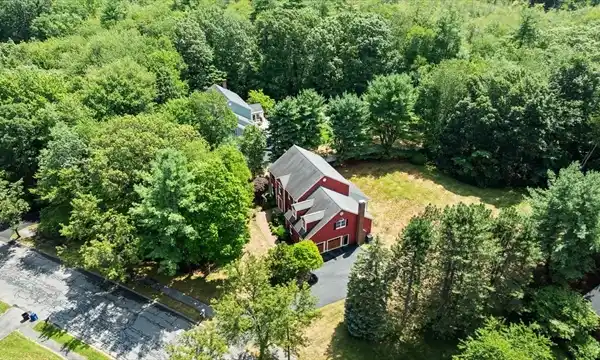 SPACIOUS COLONIAL ON A BEAUTIFULLY LANDSCAPED LOT