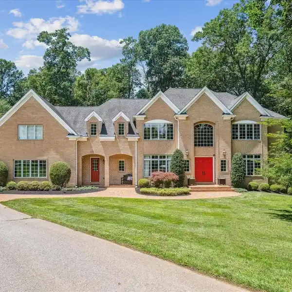 CUSTOM ALL-BRICK HOME ON FIVE-PLUS ACRES