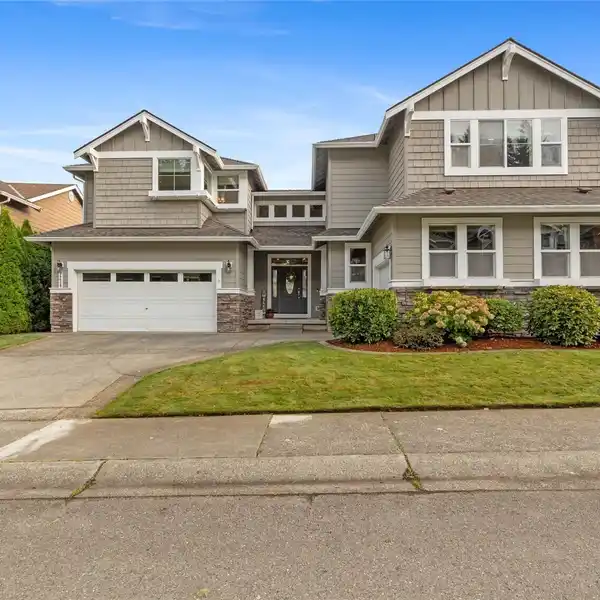 LOVINGLY MAINTAINED HOME IN SOUGHT-AFTER NEIGHBORHOOD