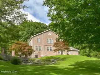 Spacious Brick Residence on over Four Acres