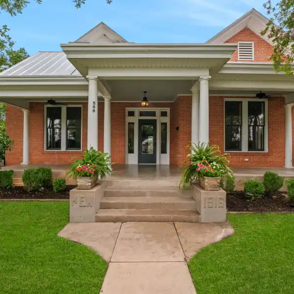 RESIDENCE WITH HISTORIC TEXAS ARCHITECTURE