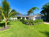 SUN-SOAKED HOME IN TUNISON PALMS
