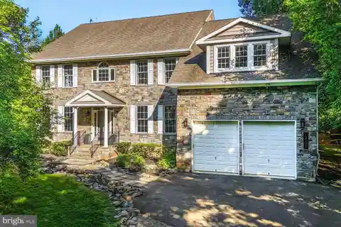 Luxurious Stone-Front Home with Outdoor Oasis