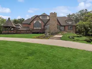 Versatile Estate on Private Acreage with Views