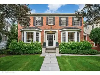 Charming Brick Home Set on Beautifully Landscaped Grounds