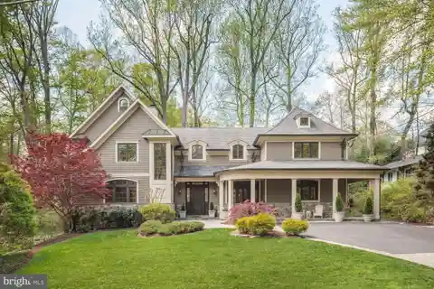 Custom Estate Nestled in Wooded Tranquility
