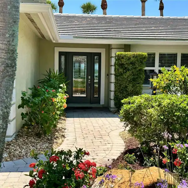 RARE HALF-ACRE WATERFRONT GEM WITH NEW ROOF