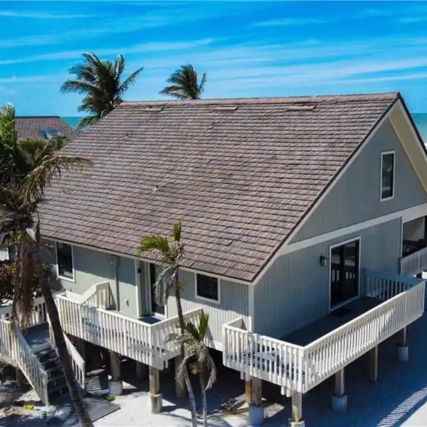 TIMELESS DESIGN MEETS BEACHFRONT SERENITY
