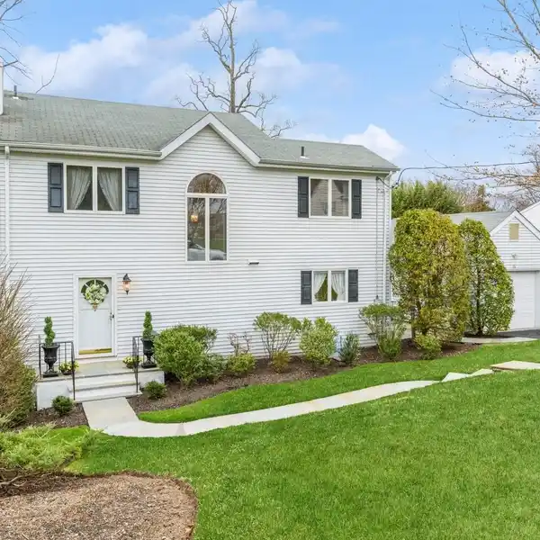 METICULOUSLY MAINTAINED COLONIAL-STYLE HOME