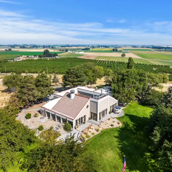 EXQUISITE CUSTOM HOME WITH VIEWS ON FIVE ACRES