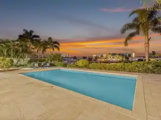 Coastal Chic Condo with Sunset Balcony Views