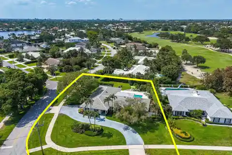 Country Club Living on a Prime Corner Lot