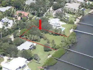 Oversized Waterfront Lot with Incredible Potential and Dock