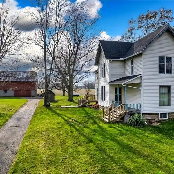 CHARMING TWO-GENERATION FARMSTEAD ON 36.99 ACRES
