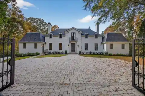 Exceptional Gated Luxury with Heated Pool and Timeless Design