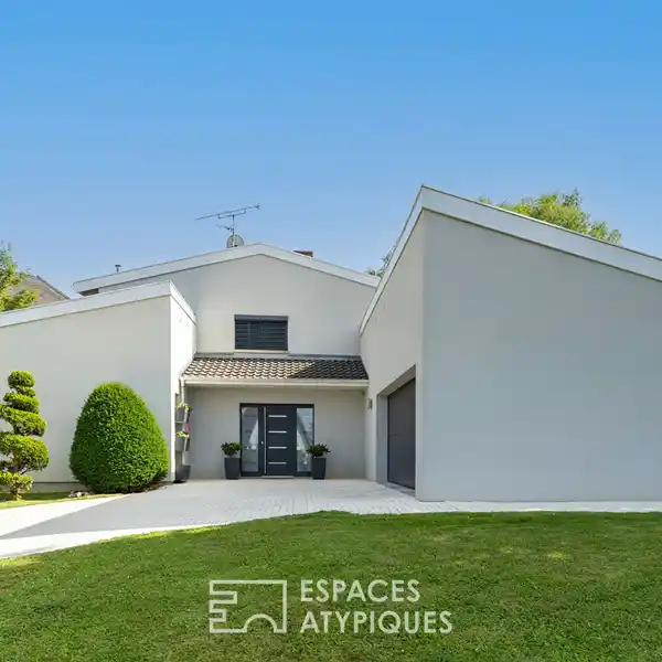STYLISH HOME SURROUNDED BY LUSH GREEN SERENITY