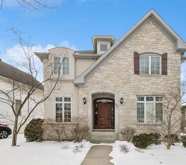 NEWER CONSTRUCTION HOME ON A COVETED STREET