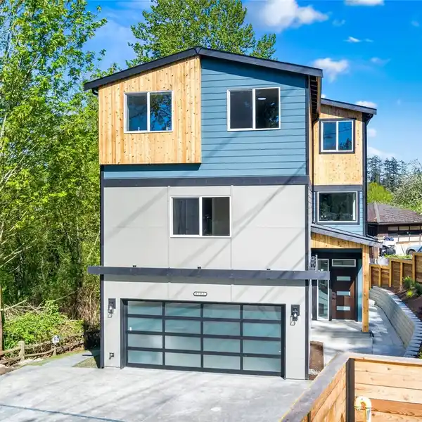 STUNNING CUSTOM HOME WITH LAKE VIEWS