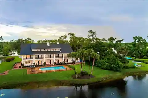 Masterfully Renovated Home Infused with Modern Elegance and Florida Charm