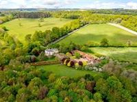 A STRIKING PERIOD HOUSE SET ON BEAUTIFULLY MAINTAINED GROUNDS