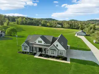 Beautifully Crafted Estate with Guest House on Five Acres