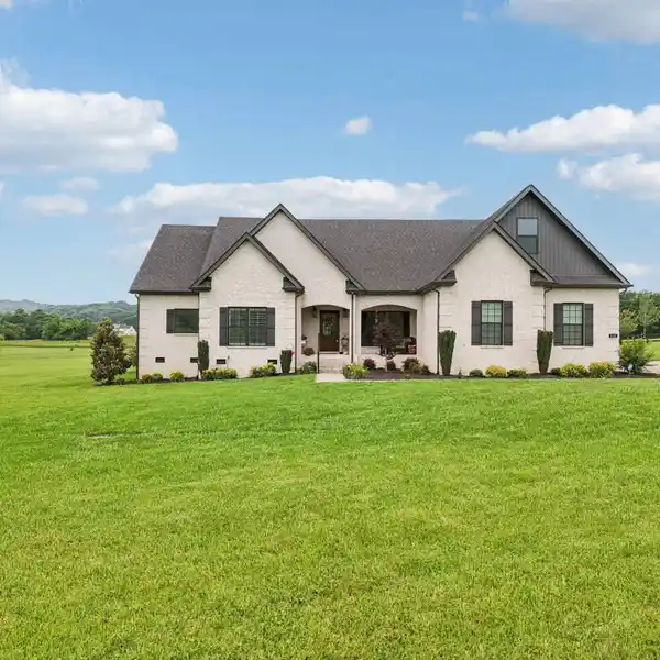 ELEGANT ONE-LEVEL LIVING ON FOUR ACRES