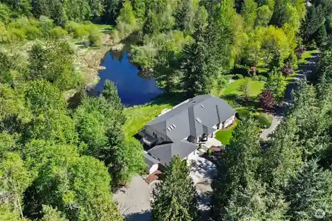 Private Estate on 7.5 Acres with Spring Fed Lake