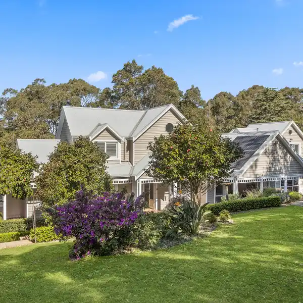 EXPANSIVE HOME IN A PEACEFUL SETTING