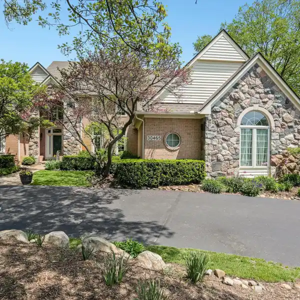 EXPANSIVE AND EXCEPTIONAL BRICK AND STONE HOME