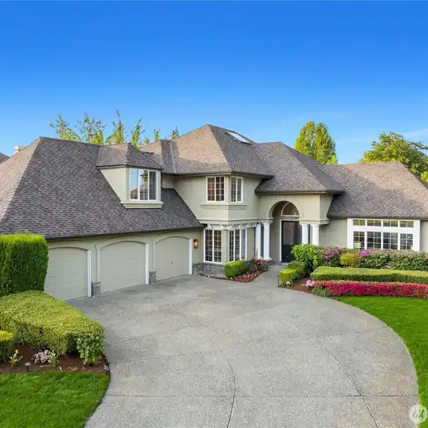 METICULOUSLY UPDATED JOHN BUCHAN-DESIGNED HOME