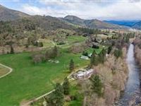 AN OREGON DREAM - 14 ACRES WITH APPLEGATE RIVER FRONTAGE