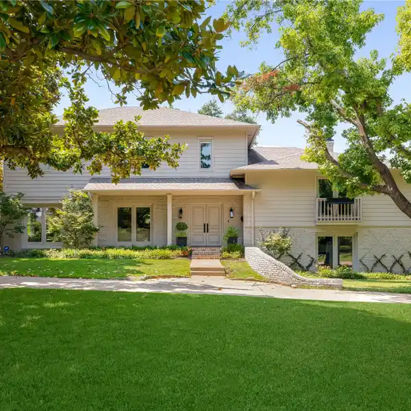 ELEGANT CORNER-LOT HOME NEAR THE HOCKADAY SCHOOL