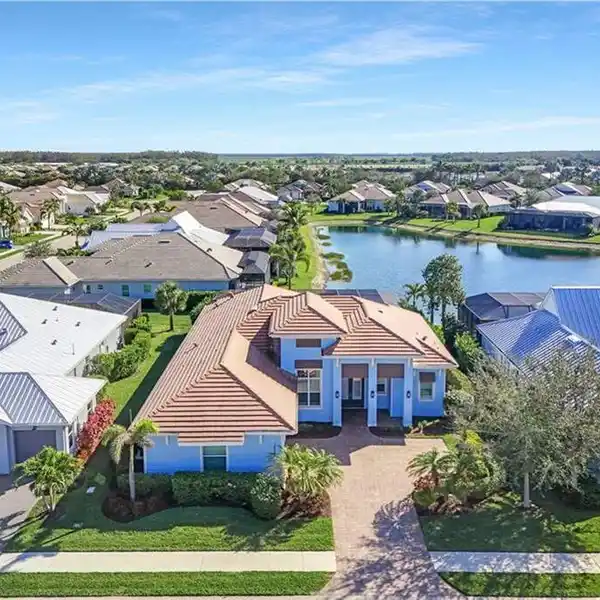 THE EPITOME OF LAKEFRONT LIVING IN NAPLES RESERVE