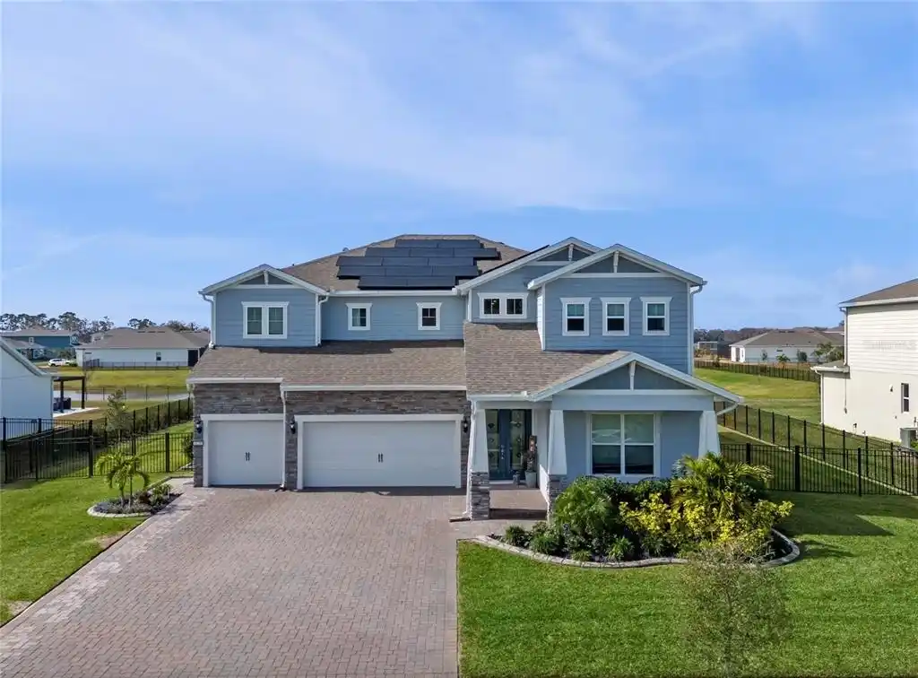 Stunning Home in the Gated Lakefront Community of Sunset Preserve