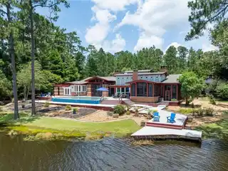 Architectural Lakefront Masterpiece with Infinity Pool