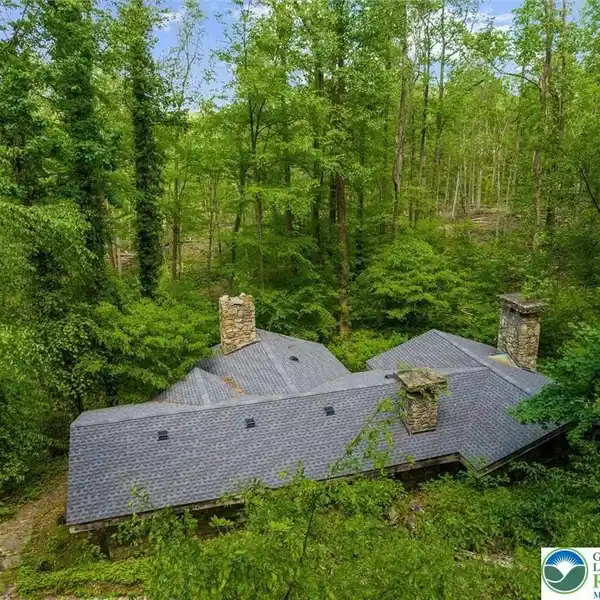 31-PLUS FORESTED ACRES WITH HISTORIC FARMHOUSE