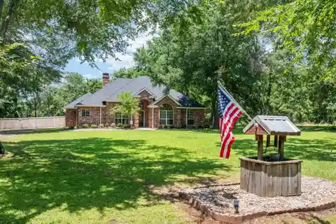 Rare Waterfront Acreage with Open Layout Home