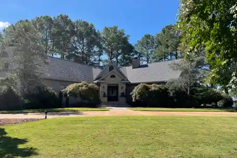 Exclusive Riverfront Estate with Versatile Design