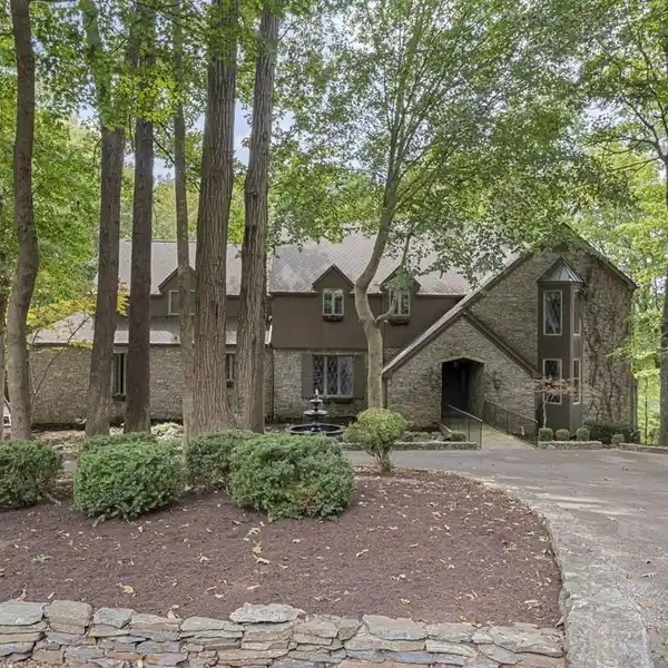 CHARMING CUL-DE-SAC HOME WITH CREEK VIEWS