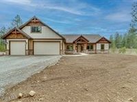 NEW CUSTOM HOME ON OVER FIVE ACRES