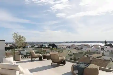 Duplex Apartment with Panoramic Coastal Sophistication