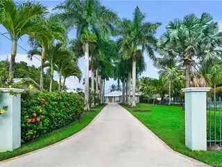 Water Front Pool Home Located in Prestigious Palm City