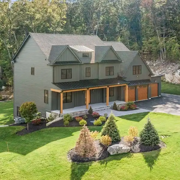 CUSTOM CRAFTED MODERN FARMHOUSE IN WHISPER WAY