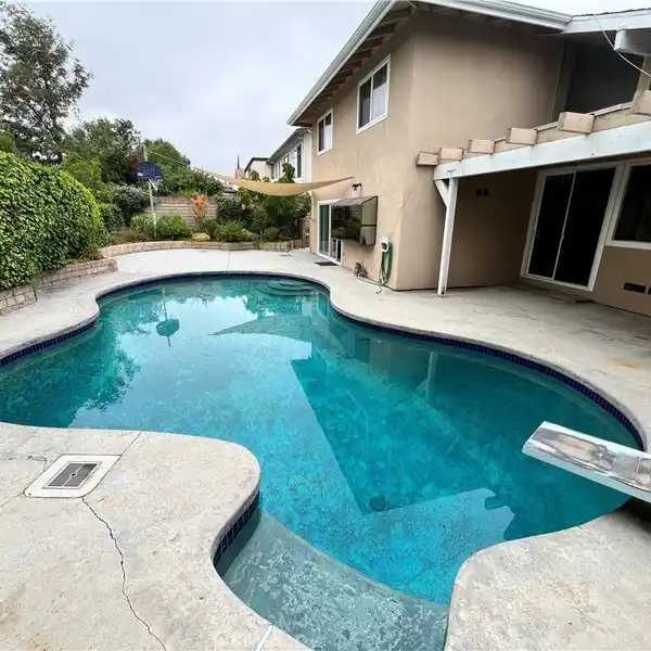SPACIOUS POOL HOME IN A SOUGHT-AFTER NEIGHBORHOOD