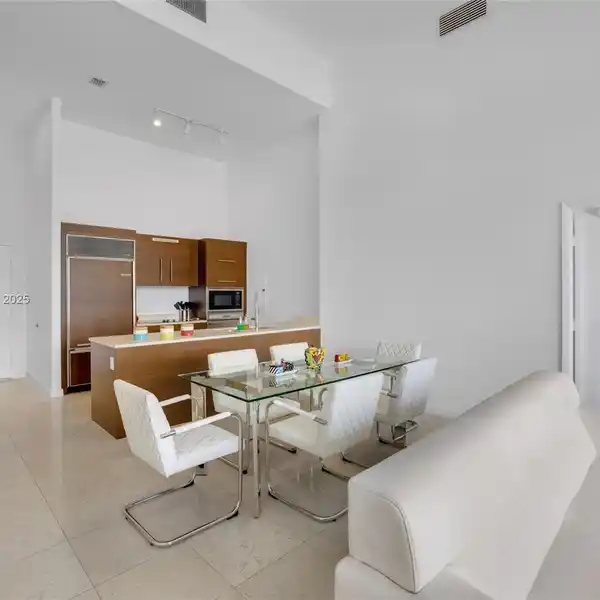 ONE-OF-A-KIND TWO BEDROOM UNIT WITH DIRECT POOL ACCESS