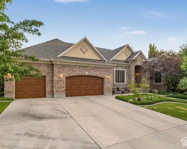 EXTENSIVELY UPGRADED LUXURY RESIDENCE ON AN EXPANSIVE LOT