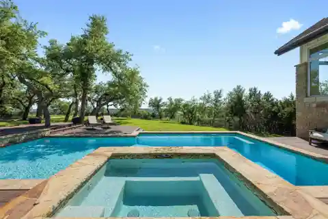 The Epitome of Hill Country Living in Coveted Belvedere